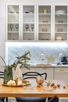 Modern kitchen-diner with Christmas decorations