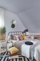 Modern country bedroom in earthy tones 