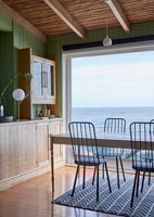 Country dining room with views over the sea 