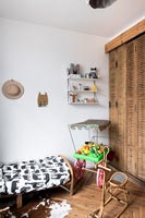 toy cart in modern childrens bedroom 
