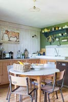 Country kitchen diner with vintage furniture 
