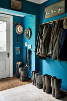 Blue painted country hallway 