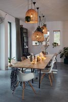 Modern dining room with concrete flooring 