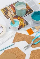 Tools and materials for creating hexagonal wall hangings from sheet of cork