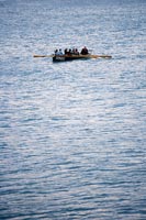 Group of rowers at sea 
