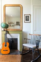 Classic fireplace with rocking chair 