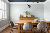 Wooden dining table in modern country dining room 