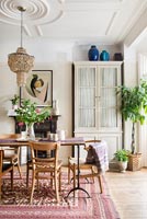 Dining room with period details and retro furniture 
