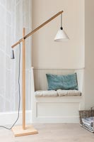 Built-in bench seat and modern wooden floor lamp 