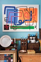 Vintage furniture and colourful artwork