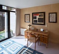 Patterned rug in modern study 