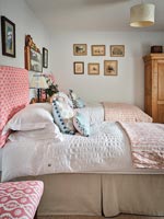 Twin beds in country bedroom 