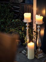 Candles in silver candelabras  