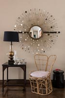 Bamboo chair and decorative vintage mirror - furniture detail 