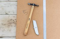 Ruler, Stanley knife and nails on cork board - Memories Notice board 