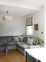 Large corner sofa in dining room 