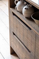 Detail of modern wooden kitchen cabinets 