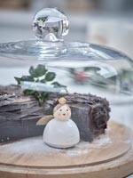 Yule log cake and ornament 