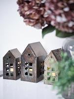 Tealights inside tiny houses - Christmas lanterns 