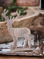 Detail of carved reindeer Christmas ornament