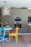 Modern kitchen with colourful furniture 