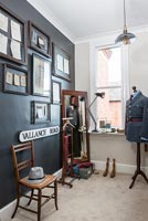 Military uniform on mannequin in vintage style bedroom 