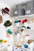 Shelves full of fascinators and hats 