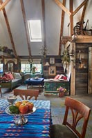 Open plan living area in barn for seating and dining