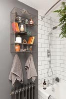 Wire wall mounted shelving in modern bathroom 