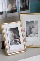 Detail of framed family photographs 