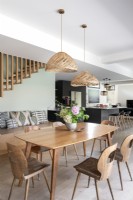 Dining area in modern open plan living space with kitchen