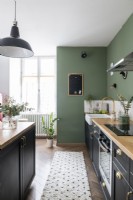 Modern green and black kitchen
