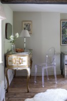 Ghost chair at dressing table in ancient stone cottage