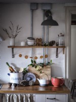 Retro kitchen featuring exposed pipes and Christmas decor