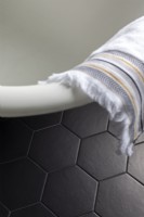 Detail of matt black hexagon floor tiles