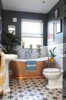 Family bathroom with copper bath
