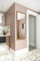 Mirror in pink grey and white bathroom