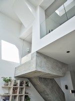 Concrete stairway in minimalistic home