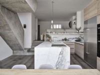 Open plan kitchen diner with concrete steps