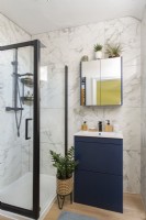 Modern bathroom with marble tiling