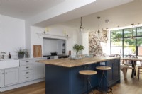 Shaker style blue and grey open plan kitchen dining room