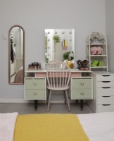 Bedroom detail showing upcycled dressing table.