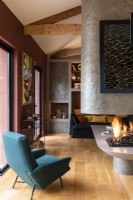 Lit central feature fireplace in contemporary living space