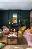 Colourful living room with parquet floors and period features