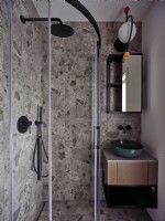 Modern bathroom with stone like tiles