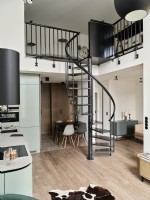 Kitchen dining room spiral staircase and mezzanine