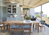 Outdoor dining area on decked terrace