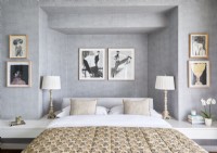 Framed artwork on grey walls of modern bedroom
