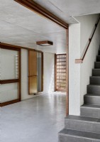 Concrete staircase in minimal hallways
