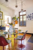 Eclectic kitchen with colourful furniture 